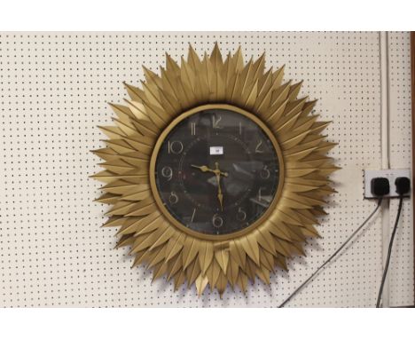 A MODERN SUNFLOWER DESIGN BLACK DIAL WALL CLOCK - DIA 75 CM 