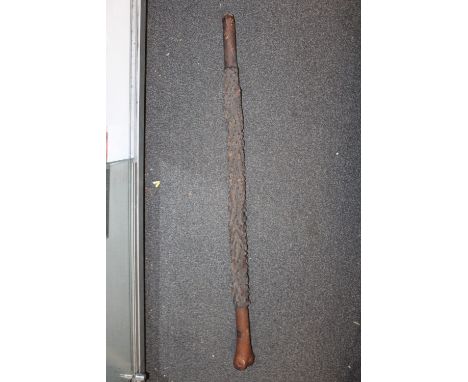 A VINTAGE AFRICAN STYLE WOODEN WALKING STICK