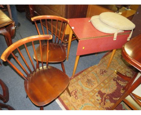 A RETRO FORMICA TOPPED DROPLEAF TABLE TOGETHER WITH A PAIR OF ERCOL CURVED BACK CHAIRS