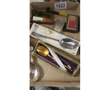 A mixed lot including commemorative spoons, small pipe, cheroot holder etc.,
