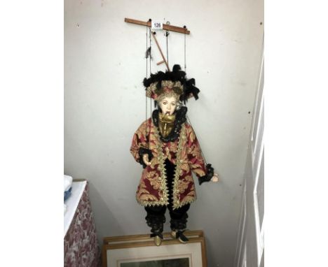 An ornate string puppet