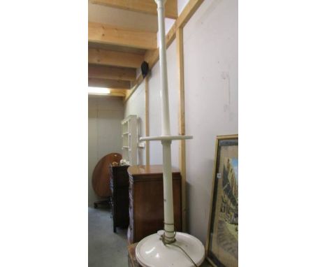 A painted standard lamp.