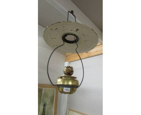 A hanging oil lamp.