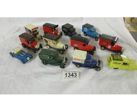 Twelve die cast model cars.