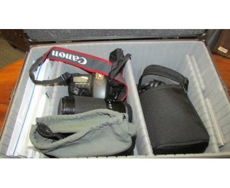 A Canon EOS 20D camera, lenses including EX Sigman 105mm 1-2.8 RMC and other accessories in a good case.