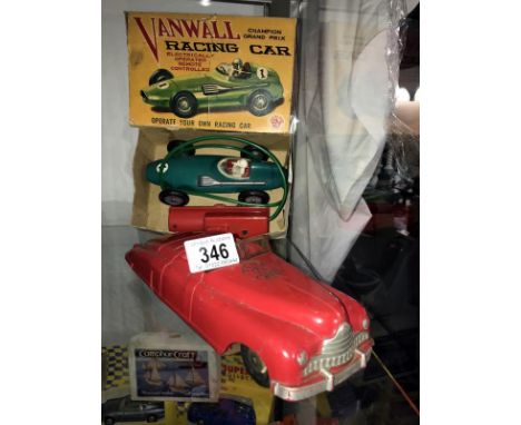 A Marx fire chief car and a boxed Empire made Vanwall racing car, battery operated