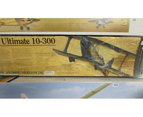 A boxed The Ultimate 10-300 R/C model aircraft kit, unchecked for completeness.