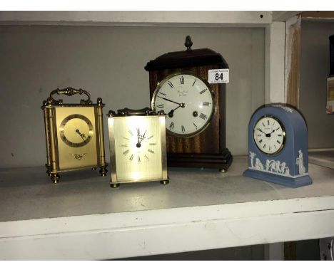A Woodford mahogany 8 day mantle clock, Wedgwood blue Jasperware clock and 2 carriage clocks