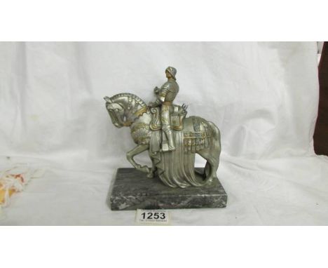 An Austrian spelter touch tip lighter of a Knight on horseback.