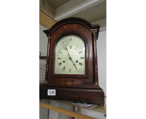 A good mahogany inlaid 8 day bracket clock. *Condition report*Both springs ok, Clock runs, but chimes strike in the wrong ord