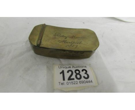 A 19th century brass snuff box.