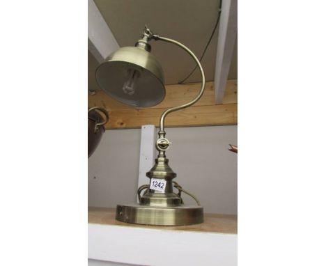 A good quality brass desk lamp.