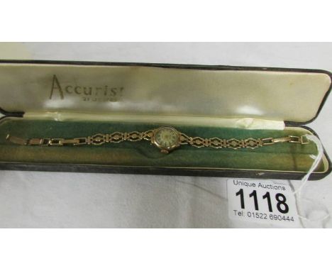 A 9ct gold Accurist ladies wrist watch.* Condition report*11.5 grams.Strap stamped 375Watch runs