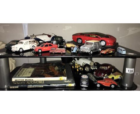 A quantity of die cast model cars &amp; quantity of books mainly on cars (2 shelves)