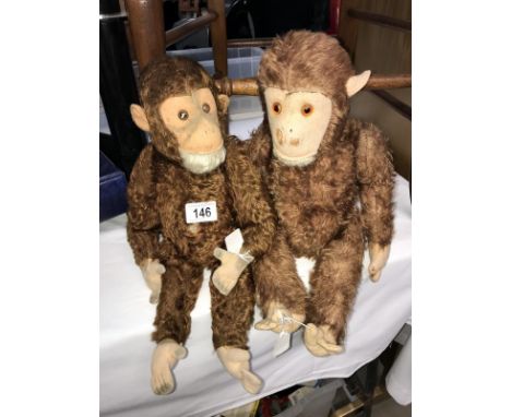 2 vintage soft toy monkeys, 1 is straw filled