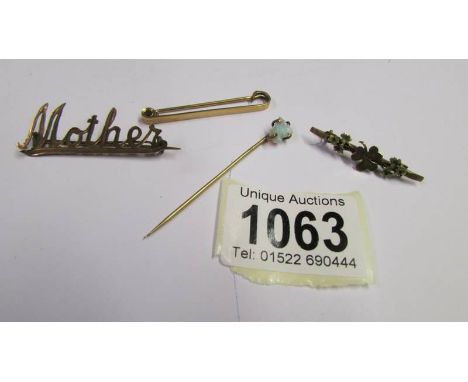 A Victorian clover brooch, a mother brooch, a bar brooch and a raw opal stick pin, all un-marked.