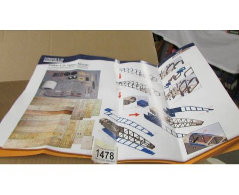A boxed Hobby King balsa wood Fokker E.111 fighter aircraft R/C model kit.