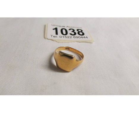 An 18ct gold signet ring, size O, 5.5 grams.