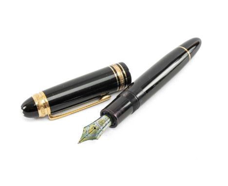 MONTBLANC BLACK RESIN ANNIVERSARY FOUNTAIN PEN, ‘75 Years of Passion and Soul’, engraved yellow metal upper cap band inset wi