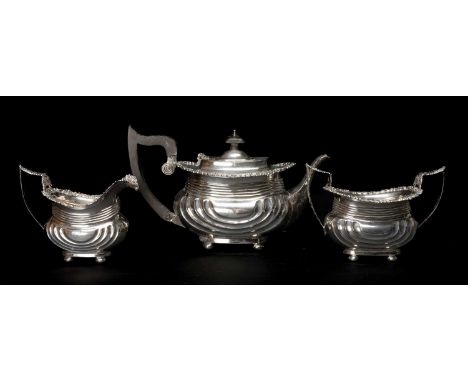 EDWARD VII THREE PIECE SILVER TEASET comprising teapot, cream jug and sucrier, engraved with initials and date 'Nov 1911', Ch
