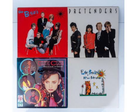 This lot includes five vintage vinyl records from iconic 1980s rock and pop bands, each featuring its original album cover. A