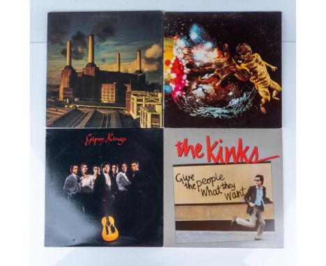 This lot features five vintage vinyl records, including albums by Tom Petty and the Heartbreakers, The Kinks, Gipsy Kings, Pi