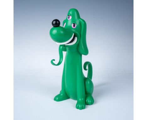 A vibrantly colored green sculpture of a smiling seated dog with a long tongue and three purple eyes. Painted resin. Limited 
