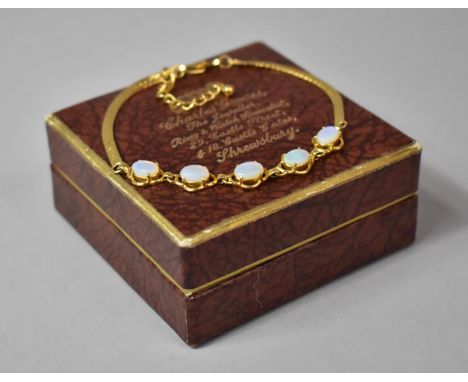 A Pretty Yellow Metal Bracelet Mounted with Five Opels, Probably Gold but not Stamped 