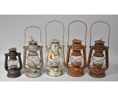 A Collection of Five Vintage Hurricane Lamps, Four Rusted 