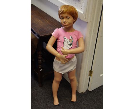 A large shop front mannequin child, red hair, 102cm high