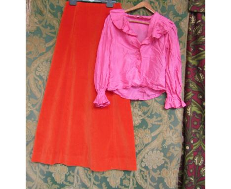 A 1960's/70's bubble gum pink silk blouse and a tangerine velvet full length skirt 