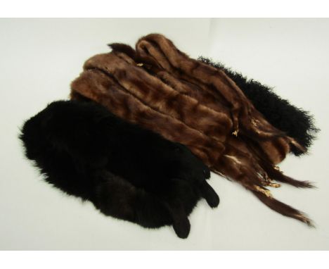 Two vintage ferret fur stoles, a black fur stole and shaggy lambs wool collar 