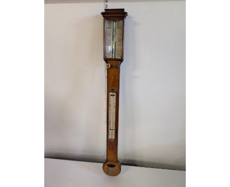 A late Georgian oak cased stick barometer. By Davis of Leeds. 97cm tall, shipping unavailable