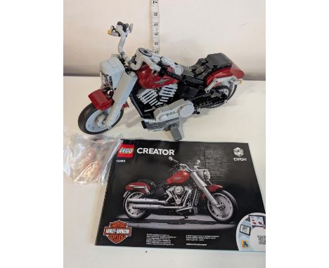 A pre-built Lego Creator Harley Davidson motorbike model 10269 with instructions.Looks to be compete. Shipping unavailable.