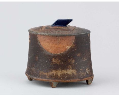 JEFF OESTREICH (born 1947); an oval stoneware footed caddy partially covered in mottled iron and copper green glaze with copp