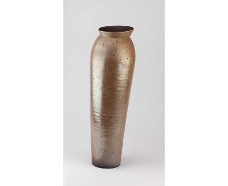 † JOANNA CONSTANTINIDIS (1927-2000); a tall leaning stoneware pot with flared rim and lustred surface, impressed C mark, heig