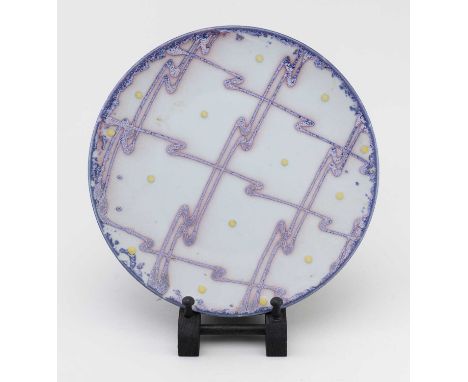 Dartington Pottery; a stoneware plate decorated with the 'Jazz' pattern designed by Janice Tchalenko, diameter 27cm.Condition