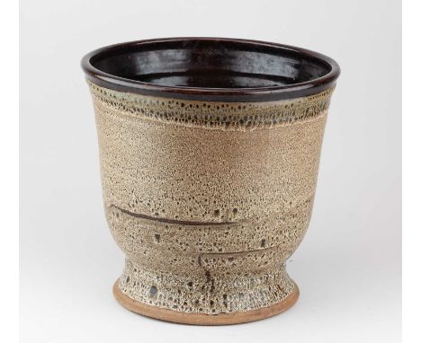 † ABDO NAGI (1941-2001); a deep stoneware planter covered in heavily mottled oatmeal glaze, height 29.5cm.Provenance: Artist'
