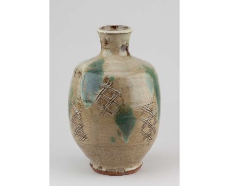 JIM MALONE (born 1946); a stoneware bottle covered in nuka glaze over iron with impressed decoration and copper green pours, 