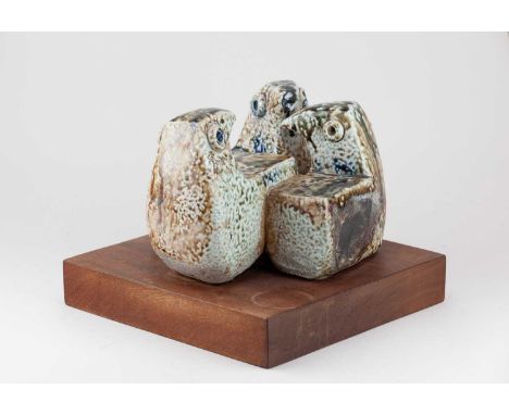 MURIEL MOODY (1907-1991); a salt glazed sculpture of three stylised doves on a square wooden base, height 22cm, base 27.5 x 2