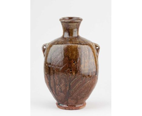 JIM MALONE (born 1946); a stoneware bottle with lug handles covered in green ash and granite glaze over iron with incised dec