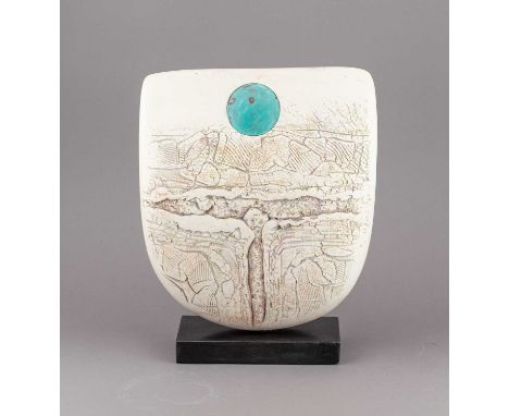 † PETER HAYES (born 1946); a large raku bow with fractured cream surface and copper patina disc mounted on slate base, incise