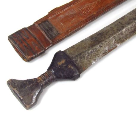 A double edge sword, with leather grip handle and scabbard, with a heavy shaped rounded blade, 83cm wide. 