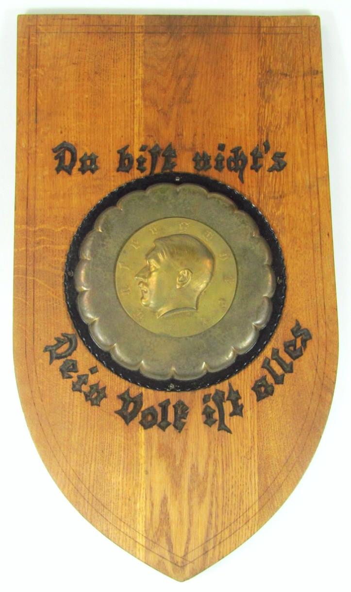 A Third Reich Hitler Jugend oak shield, entitled 'Du Bist Nichts Dein Volk sind Alles' 'You A A Third Reich Hitler Jugend oak shield, entitled 'Du Bist Nichts Dein Volk sind Alles' 'You A