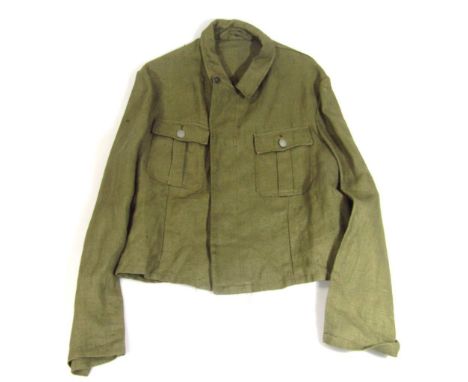 A Wiemar Republic/Third Reich Hitler Jugend Drell Jacke marked 01260, in green cotton material having full length button in f
