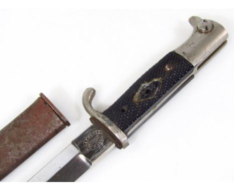 A Third Reich double edged dagger/bayonet by W Hollen Solingen, with single guard, knurled grip with two securing bolts, diam