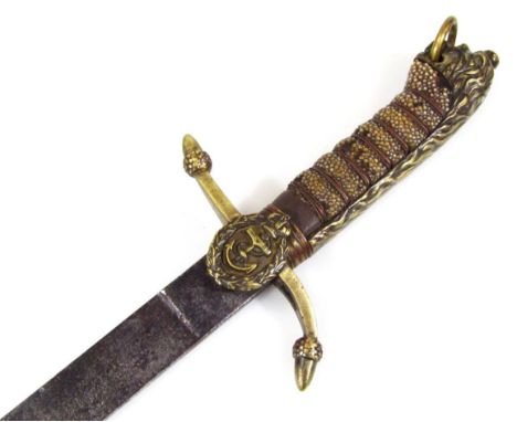 A Victorian Royal Navy Midshipman Dirk, 1879 pattern, with turned grip, anchor mount, lion head pommel and tapering blade, 62