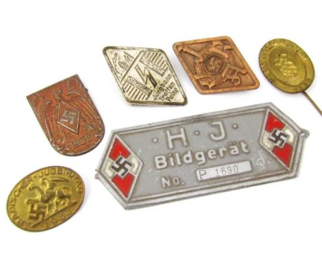 A collection of Third Reich 'Tinnies', including Jugentag badges, and a projector badge. (6)