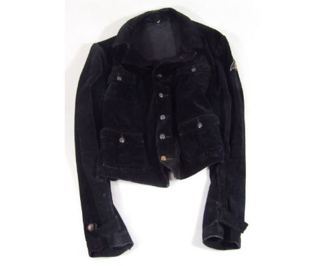 A Wiemar Republic/Third Reich corduroy tunic, having full button, two breast pockets and two waist pockets with left arm band