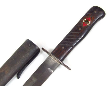 A Weimar Republic/Third Reich double edged dagger, with solingen blade marks, flat guard and wooden handle with three securin